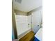 Well-lit bathroom with a white tub/shower combo and vinyl floor offers a clean and functional space at 2502 Barge Sw Rd, Atlanta, GA 30331