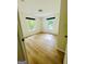 Bright bedroom with two windows and beautiful wood flooring at 2502 Barge Sw Rd, Atlanta, GA 30331
