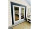 Double doors leading to patio with bench seating at 2502 Barge Rd Sw, Atlanta, GA 30331