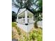 Charming home with a covered porch, featuring stone landscaping, fresh paint and a well-manicured lawn at 2502 Barge Sw Rd, Atlanta, GA 30331