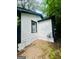 Charming home with a covered porch, featuring stone landscaping, fresh paint and a well-manicured lawn at 2502 Barge Sw Rd, Atlanta, GA 30331