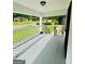 Cozy porch overlooking a serene neighborhood, offers the perfect spot for relaxation at 2502 Barge Sw Rd, Atlanta, GA 30331
