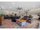 Spacious living area with an open kitchen, comfortable seating, and decorative touches for a modern feel at 9511 High Point Rd, Villa Rica, GA 30180