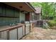 Well-equipped outdoor kitchen featuring stainless steel grill and sink, perfect for entertaining at 9511 High Point Rd, Villa Rica, GA 30180