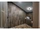 Tiled shower featuring a pebble floor and recessed lighting at 9511 High Point Rd, Villa Rica, GA 30180