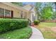 A view of a single-story home with covered porch and landscaping at 40 Green Leaf Cir, Hampton, GA 30228