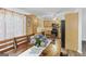 Well-lit kitchen and dining area with stainless steel appliances and wood cabinets at 40 Green Leaf Cir, Hampton, GA 30228