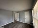 A versatile room featuring newly installed floors, fresh paint, and minimalist trim at 6982 Knollwood Dr, Morrow, GA 30260