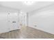 Spacious basement with tile floors and doors leading to different rooms at 1153 Dawn View Nw Ln, Atlanta, GA 30327