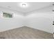 Bright bedroom with tile floors, a single window, and closet at 1153 Dawn View Nw Ln, Atlanta, GA 30327
