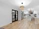 Open concept modern kitchen with stainless steel appliances, large island, and hardwood floors at 1153 Dawn View Nw Ln, Atlanta, GA 30327