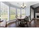 Bright dining area with lots of natural light and wood flooring at 308 Dylan Way, Mcdonough, GA 30252