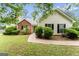 Charming single-story home with well-manicured lawn, walkway, and inviting curb appeal at 308 Dylan Way, Mcdonough, GA 30252