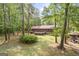 The large private backyard is great for entertaining or relaxing in the shade at 6537 Walker Rd, Riverdale, GA 30296