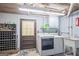 The laundry room offers a washer, dryer, and utility sink for convenience at 6537 Walker Rd, Riverdale, GA 30296