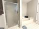 Bathroom featuring a glass enclosed shower and a separate soaking tub at 60 Carriage Gate Dr, Sharpsburg, GA 30277