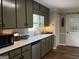 Kitchen featuring updated appliances and plenty of storage at 60 Carriage Gate Dr, Sharpsburg, GA 30277