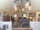 View of an open living room with hardwood floors at 60 Carriage Gate Dr, Sharpsburg, GA 30277