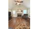 Living room featuring a fireplace and plush seating at 60 Carriage Gate Dr, Sharpsburg, GA 30277