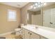 Bathroom features large mirror and vanity with cabinets at 7963 Smith Rd, Villa Rica, GA 30180