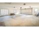 A large, bright garage with plenty of natural light, and shuttered windows at 7963 Smith Rd, Villa Rica, GA 30180
