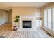 Close-up view of the living room fireplace and built-in shelving with new flooring and neutral paint at 7963 Smith Rd, Villa Rica, GA 30180
