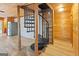 Unique interior with a spiral staircase and views of the kitchen at 1597 Leguin Mill Rd, Locust Grove, GA 30248
