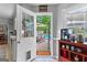 View through kitchen doorway to patio, swimming pool and backyard at 317 Calgary Dr, Peachtree City, GA 30269