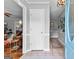 Bright entryway showcasing neutral paint, tile flooring, and access to the living spaces at 317 Calgary Dr, Peachtree City, GA 30269