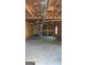 Large unfinished basement with exposed beams and ductwork at 8828 Patricia Rose, Douglasville, GA 30134