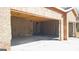 Spacious two-car garage interior with unfinished walls at 8828 Patricia Rose, Douglasville, GA 30134