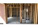 View of Living room under construction with studs, door and electrical boxes at 8828 Patricia Rose, Douglasville, GA 30134