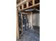 Unfinished basement showing the water heater and furnace for the home at 8828 Patricia Rose, Douglasville, GA 30134