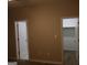 Neutral bedroom with doors, closet, and plank flooring provides a relaxing atmosphere at 320 Sharon Dr # A & B, Fayetteville, GA 30214