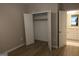 Bedroom with LVP floors and a closet leading to the bathroom at 320 Sharon Dr # A & B, Fayetteville, GA 30214