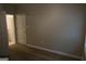 Bright bedroom featuring luxury vinyl flooring and neutral paint at 320 Sharon Dr # A & B, Fayetteville, GA 30214