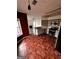 Open kitchen features stainless steel appliances, tile floors and plenty of cabinet storage at 150 Riversong Dr, Alpharetta, GA 30022