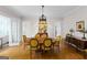 Formal dining room with chandelier lighting and beautiful hardwood floors at 171 Westminster Ne Dr, Atlanta, GA 30309