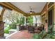 Relaxing front porch featuring comfortable seating, stylish tile flooring, and a tranquil outdoor atmosphere at 171 Westminster Ne Dr, Atlanta, GA 30309