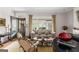 Well-lit living room featuring stylish seating, hardwood floors, and elegant details with beautiful windows at 171 Westminster Ne Dr, Atlanta, GA 30309