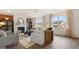 Cozy living room with a fireplace and natural lighting at 679 Edgar, Hampton, GA 30228