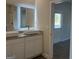 Elegant bathroom featuring dual sinks, granite countertops, modern fixtures, and a well-lit vanity area at 5322 Tolar Rd # 27, South Fulton, GA 30213