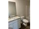Updated bathroom features modern vanity with granite countertop, toilet and tub/shower combo at 5322 Tolar Rd # 27, South Fulton, GA 30213