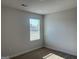 Sunlit bedroom with a neutral palette, carpet flooring, and ample natural light creates a calming atmosphere at 5322 Tolar Rd # 27, South Fulton, GA 30213