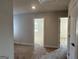 Bedroom with neutral carpet and paint, showing the doorways to other rooms at 5322 Tolar Rd # 27, South Fulton, GA 30213