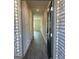 Inviting entryway featuring wood-look flooring, neutral walls, and a glimpse into the open-concept layout at 5322 Tolar Rd # 27, South Fulton, GA 30213