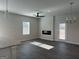 Bright living area with fireplace, modern lighting, and an open layout at 5322 Tolar Rd # 27, South Fulton, GA 30213