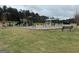 Community playground with swings, slides, and green space for outdoor recreation and enjoyment at 5322 Tolar Rd # 27, South Fulton, GA 30213
