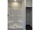 New shower and closet featuring white shower with built in seats and shelving in the closet at 5322 Tolar Rd # 27, South Fulton, GA 30213