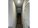 Stairway with carpeted steps and white trim, leading to the upper level at 5322 Tolar Rd # 27, South Fulton, GA 30213